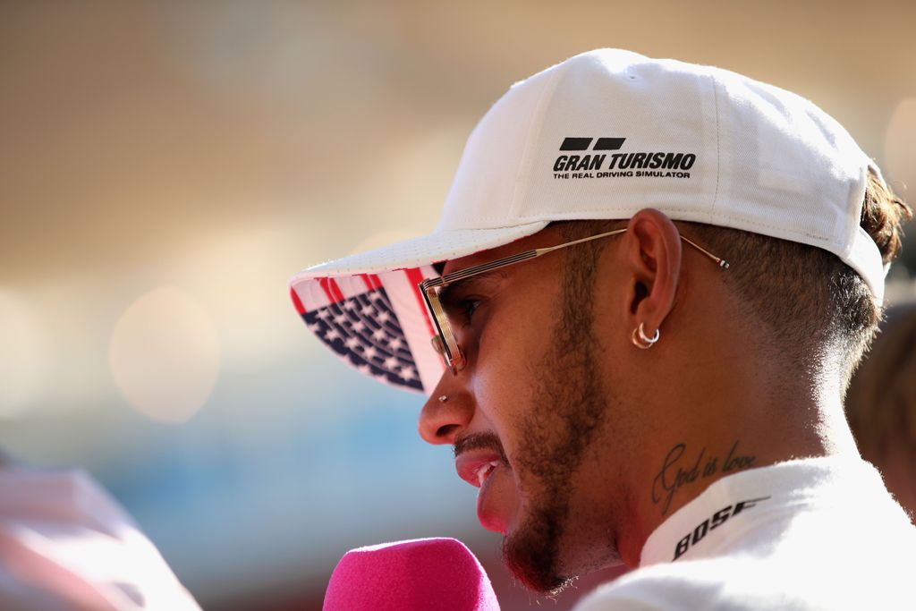 Race winner Lewis Hamilton of Great Britain and Mercedes GP talks to the media after the United States Formula One Grand Prix at Circuit of The Americas on October 22, 2017 in Austin, Texas. Clive Mason/AFP
