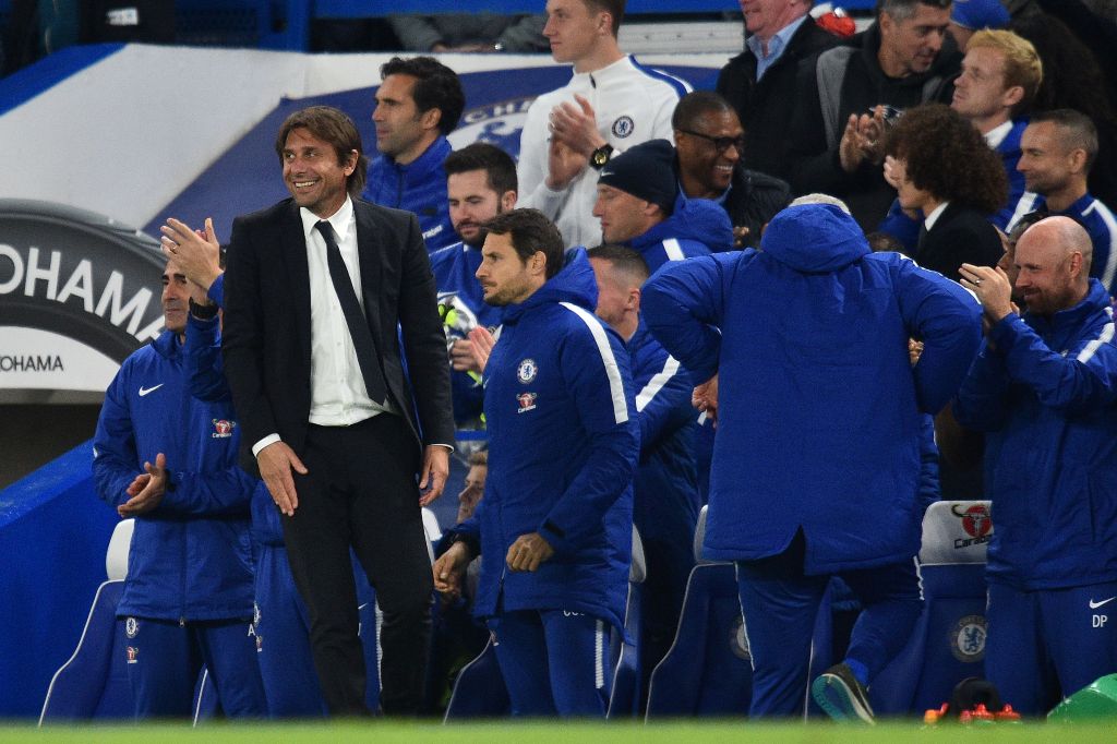 Chelsea's Italian head coach Antonio Conte reacts after Chelsea scored their second goal during the English League Cup fourth round football match between Chelsea and Everton at Stamford Bridge in London on October 25, 2017.