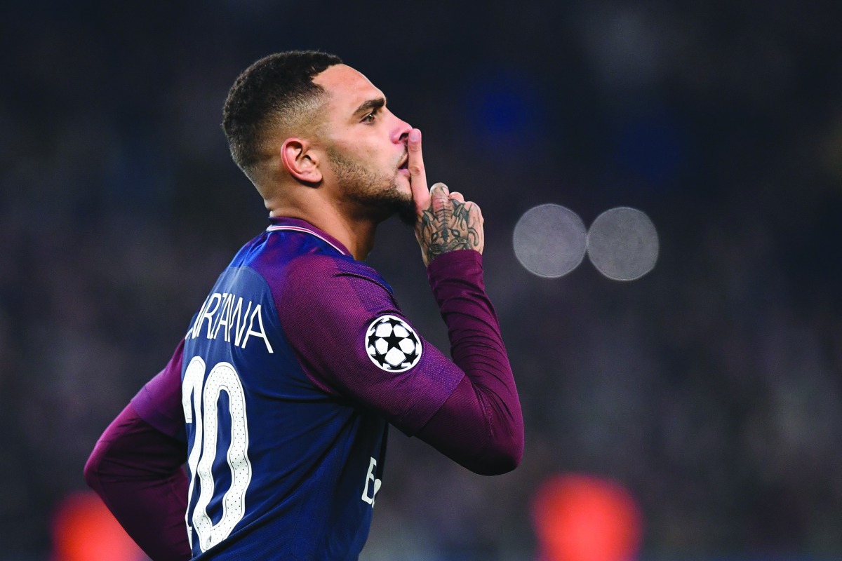 Paris Saint-Germain’s French defender Layvin Kurzawa celebrates after scoring one of his three goals during the UEFA Champions League match against Anderlecht (RSCA)  at the Parc des Princes Stadium in Paris yesterday.