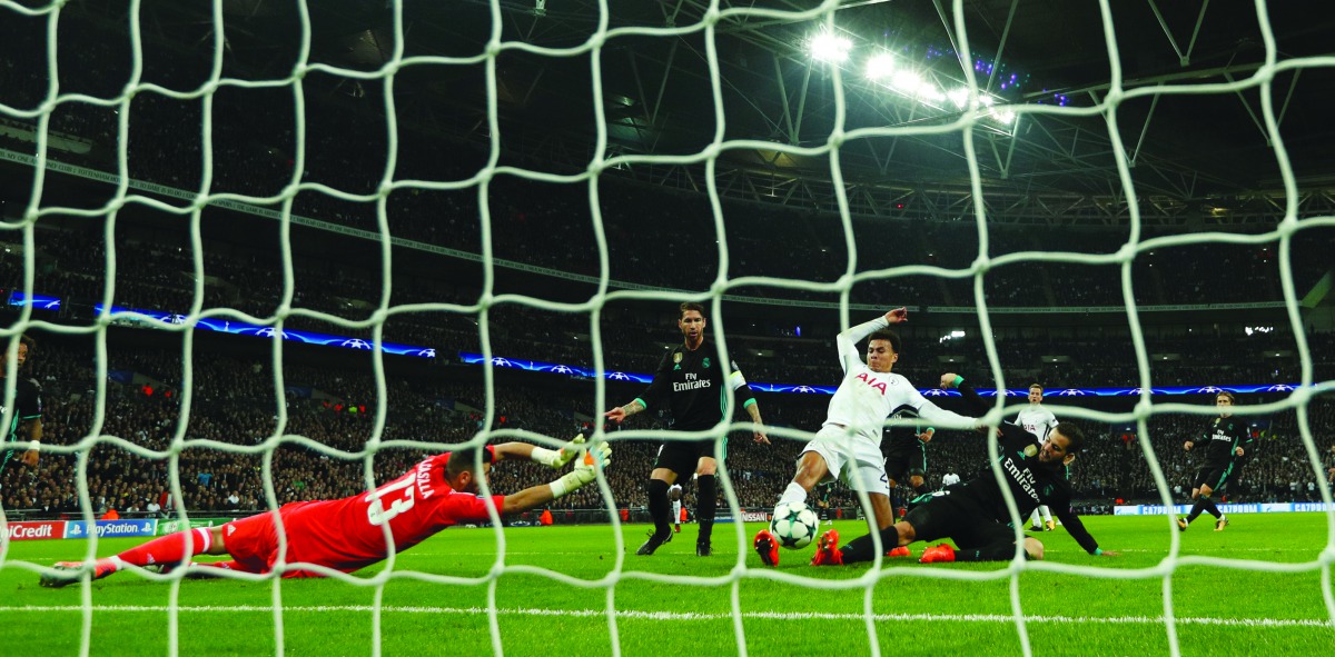 Tottenham’s Dele Alli scores their first goal against Real Madrid during the Champions League match against Real Madrid at the Wembley Stadium in London yesterday.