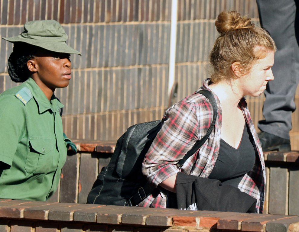 A file photo of US citizen Martha O'Donovan being led into a remand truck outside court in Harare, Zimbabwe November 4, 2017. REUTERS/Philimon Bulawayo
