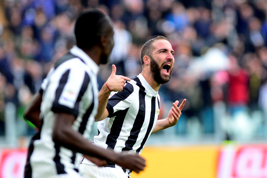 Juventus’ Gonzalo Higuain celebrates scoring their first goal REUTERS/Massimo Pinca
