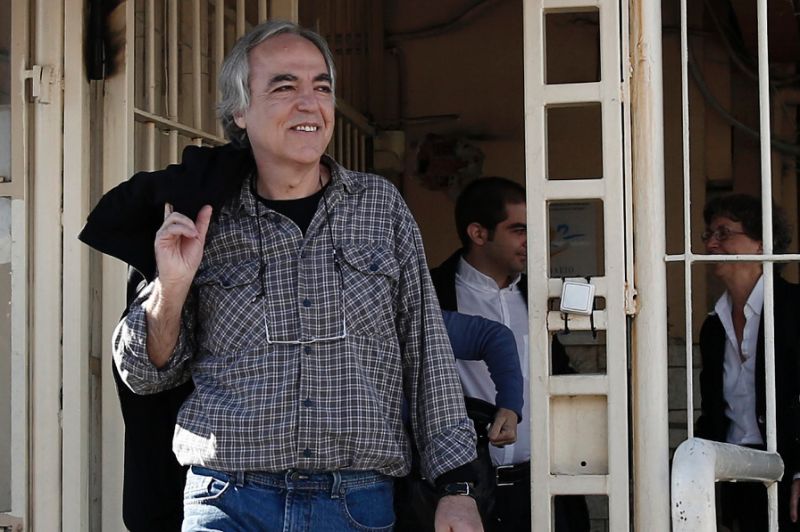 Convicted assasin of extremist group November 17, Dimitris Koufontinas, exits prison in Athens for a controversial two-day leave (AFP /Stelios Misinas)