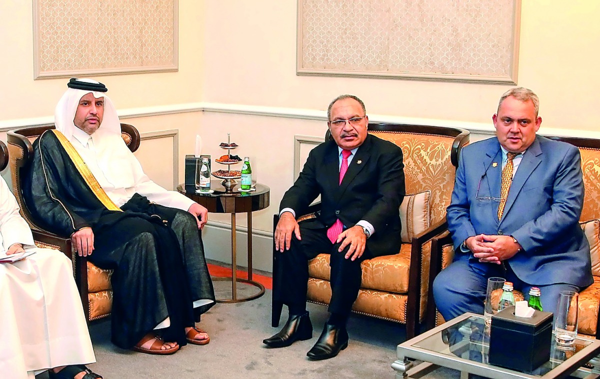 Minister of Economy and Commerce H E Sheikh Ahmed bin Jassim bin Mohammed Al Thani with the Prime Minister of Papua New Guinea, Peter O’Neill, and his accompanying delegation, currently visiting the State of Qatar. During the meeting, they reviewed bilate