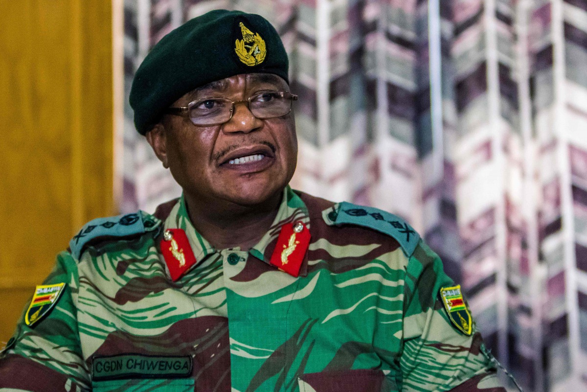 This file photo taken on November 13, 2017 shows Army General Constantino Chiwenga Commander of the Zimbabwe Defence Forces addressing a media conference held at the Zimbabwean Army Headquarters in Harare. AFP / Jekesai Njikizana