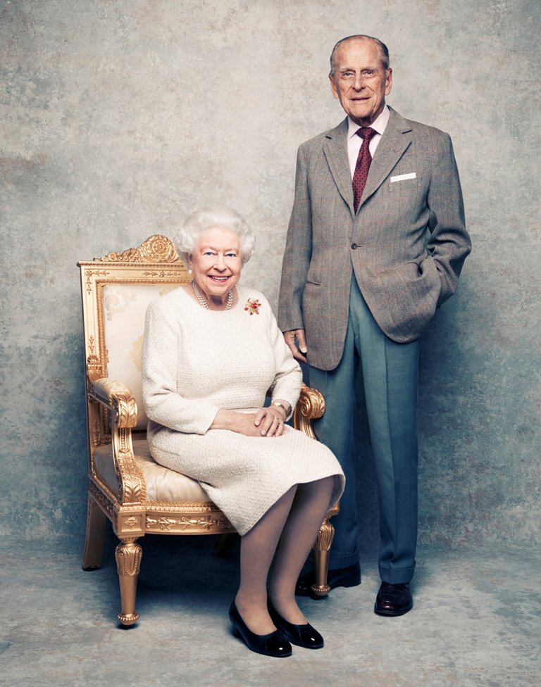 A handout file photo of Britain's Queen Elizabeth and Prince Philip in the White Drawing Room at Windsor Castle in early November, pictured against a platinum-textured backdrop, in celebration of their platinum wedding anniversary on November 20, 2017. Ma