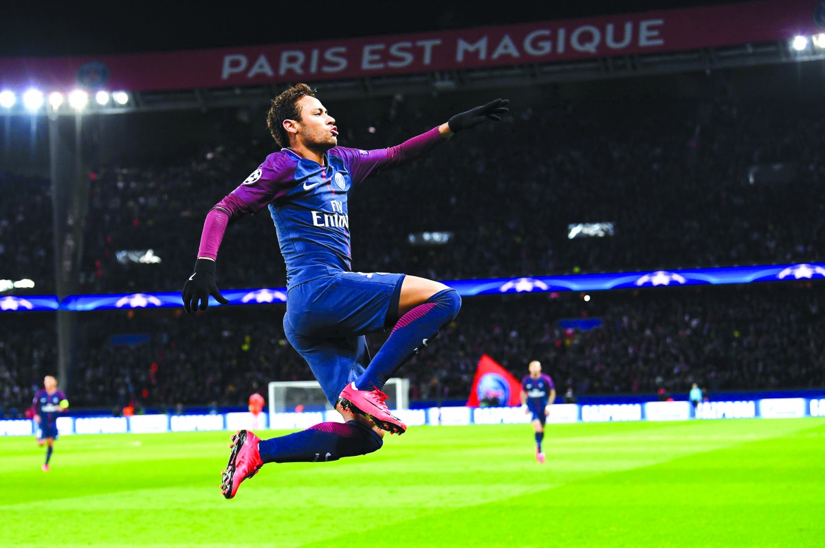 Paris Saint-Germain’s  Brazilian striker Neymar  celebrates after scoring his second  goal against Glasgow Celtic during their UEFA Champions League Group B football match played at Parc des Princes Stadium in Paris
