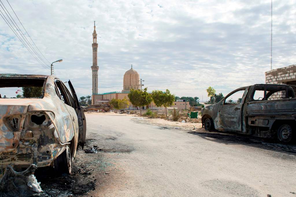 A picture taken on November 25, 2017, shows the Rawda mosque, roughly 40 kilometres west of the North Sinai capital of El-Arish, after a gun and bombing attack.  AFP / STR
