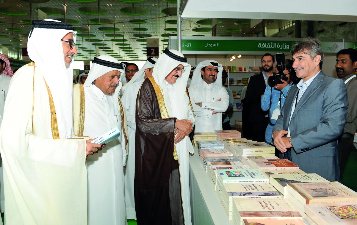 Minister of Culture and Sports H E Dr Salah bin Ghanem Al Ali with Minister of State H E Dr Hamad bin Abdulaziz Al Kawari, Qatari businessman Sheikh Faisal bn Qassim Al Thani and other officials at the 28th Doha International Book Fair in Doha, yesterday.