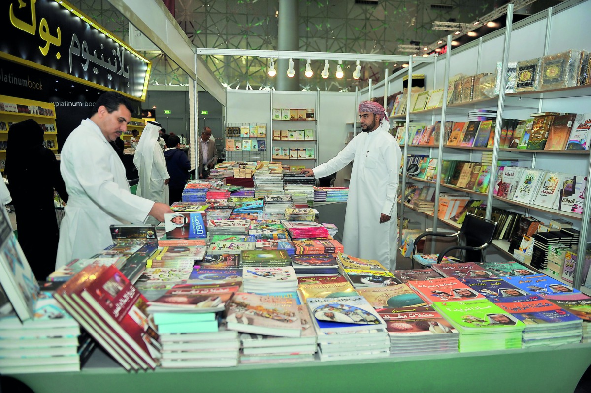 Visitors at a stall during the 28th Doha International Book Fair at Doha Exhibition and Convention Center, yesterday. Pic: Baher Amin / The Peninsula