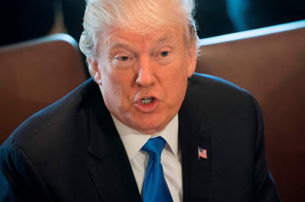 US President Donald Trump holds a Cabinet Meeting in the Cabinet Room at the White House in Washington, DC, December 6, 2017. / AFP / SAUL LOEB