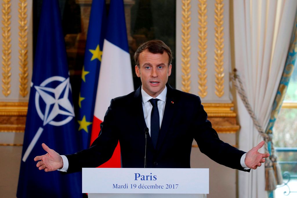 French President Emmanuel Macron speaks during a press conference with NATO Secretary-General at the Elysee Palace in Paris, on December 19, 2017. / AFP / PHILIPPE WOJAZER