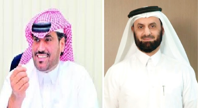 COO of Qatar Post Hamad Al Fahida and Engineer Faisal Al Siddiqi, Chief Business Development Officer of Nebras Power
