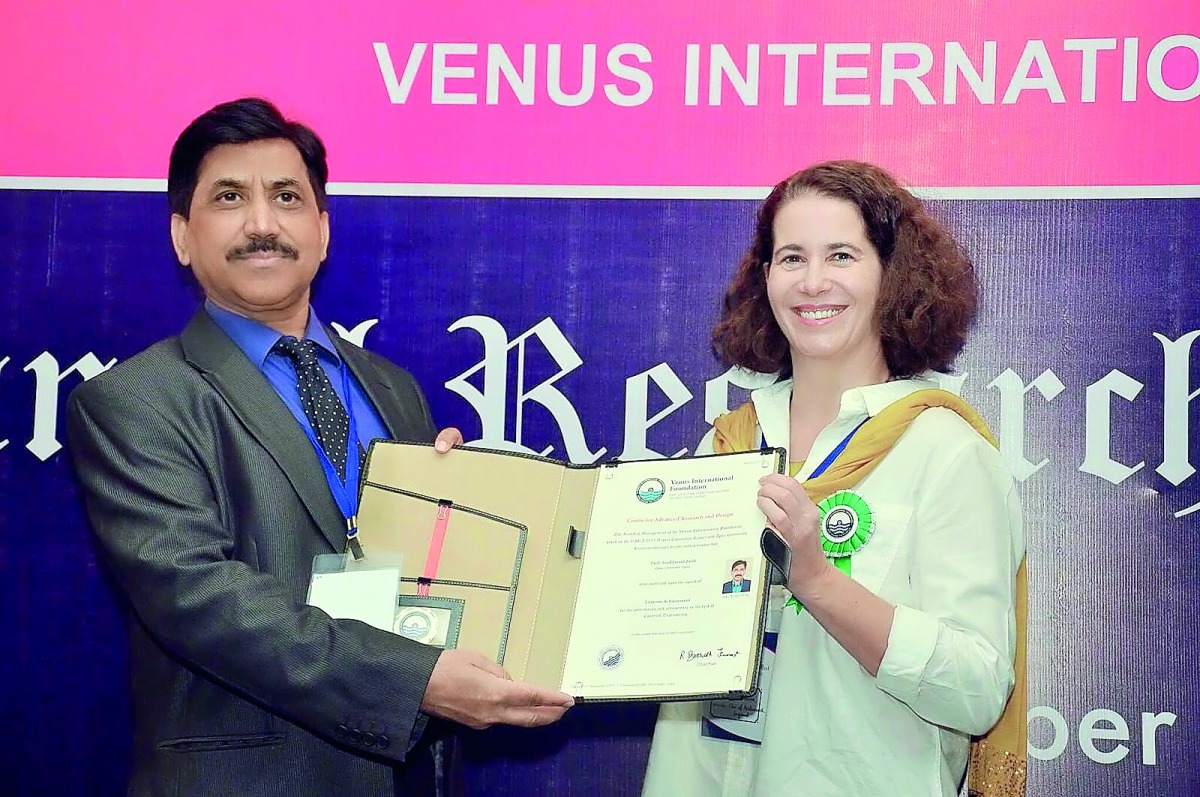 Professor Syed Javaid Zaidi receiving the award. 