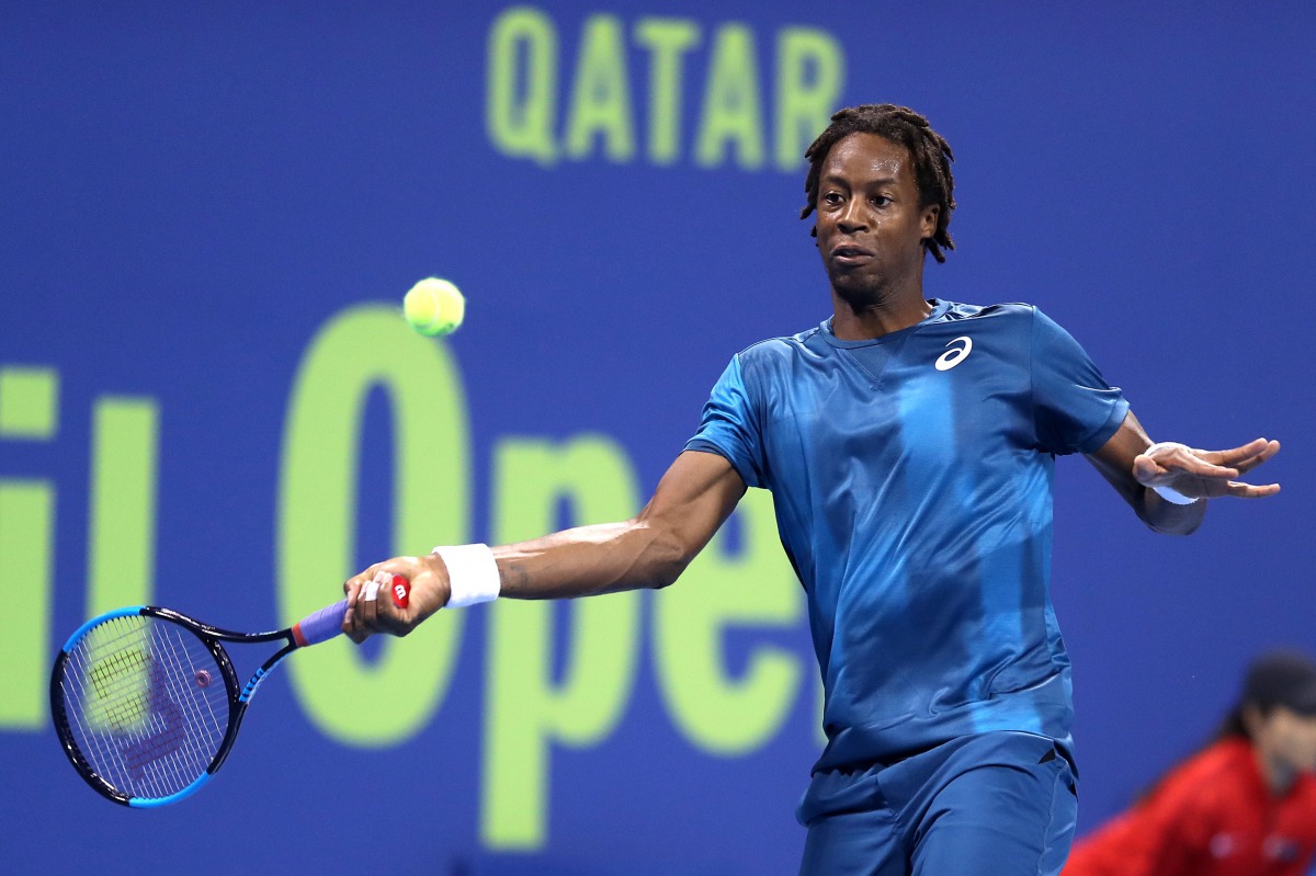 France's Gael Monfils returns the ball to Peter Gojowczyk during the quarter-final of the ATP Qatar Open tennis competition in Doha on January 4, 2018. AFP / Karim Jaafar
