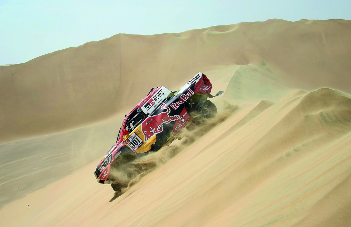 Toyota’s Qatari driver Nasser Al Attiyah and his co-driver Mathieu Baumel of France compete during the Stage 1 of the 2018 Dakar Rally on Saturday.