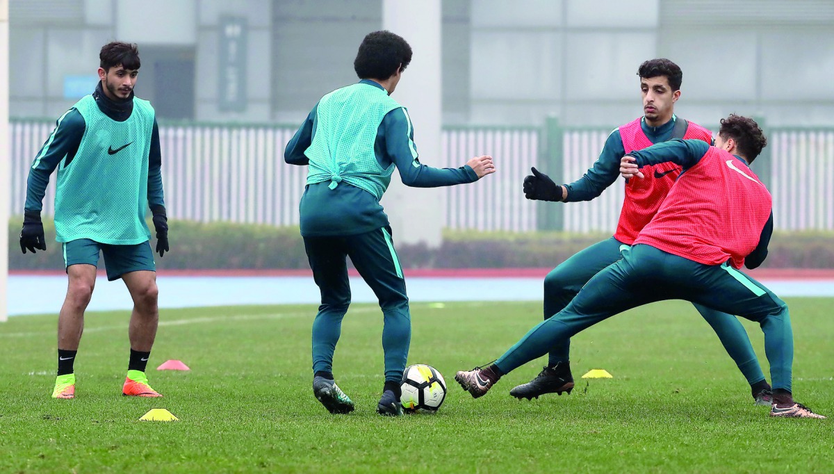 Qatari players in action during a practice session in Changzhou, China yesterday. 