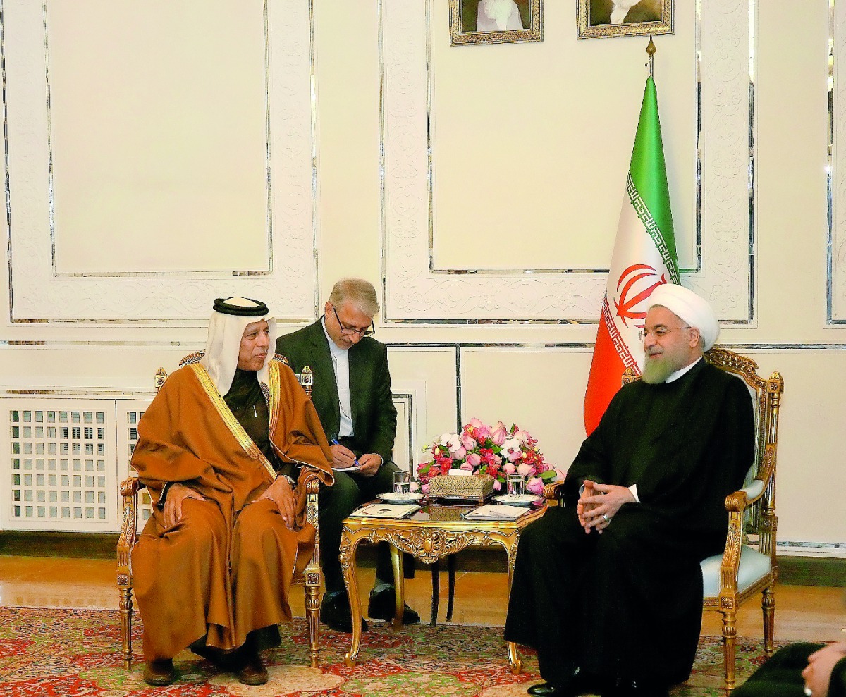 Speaker of Advisory Council H E Ahmed bin Abdullah bin Zaid Al Mahmoud, with Iranian President Dr Hassan Rowhani.