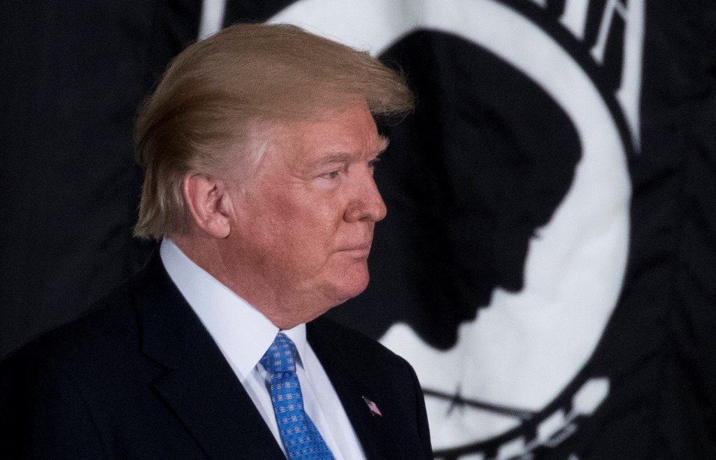 US President Donald J. Trump participates in a Congressional Gold Medal Ceremony in honour of former Senate Majority Leader Bob Dole in the Rotunda of the US Capitol in Washington, DC, USA, 17 January 2018. EPA/SHAWN THEW
