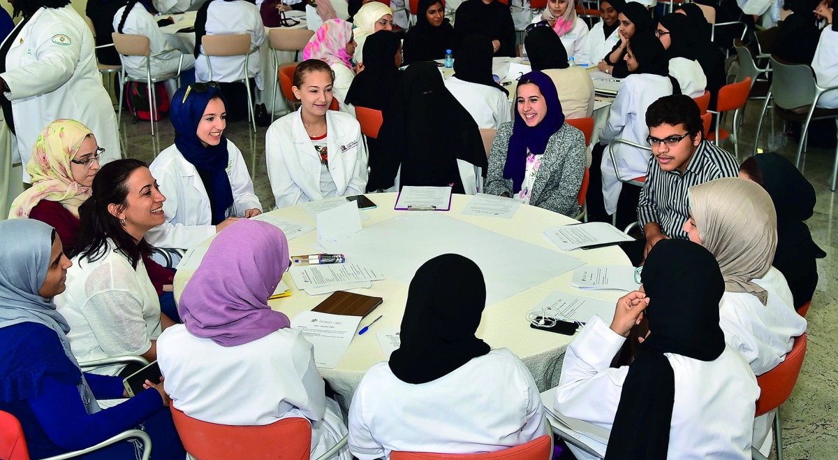 Students working in teams at the IPE event.