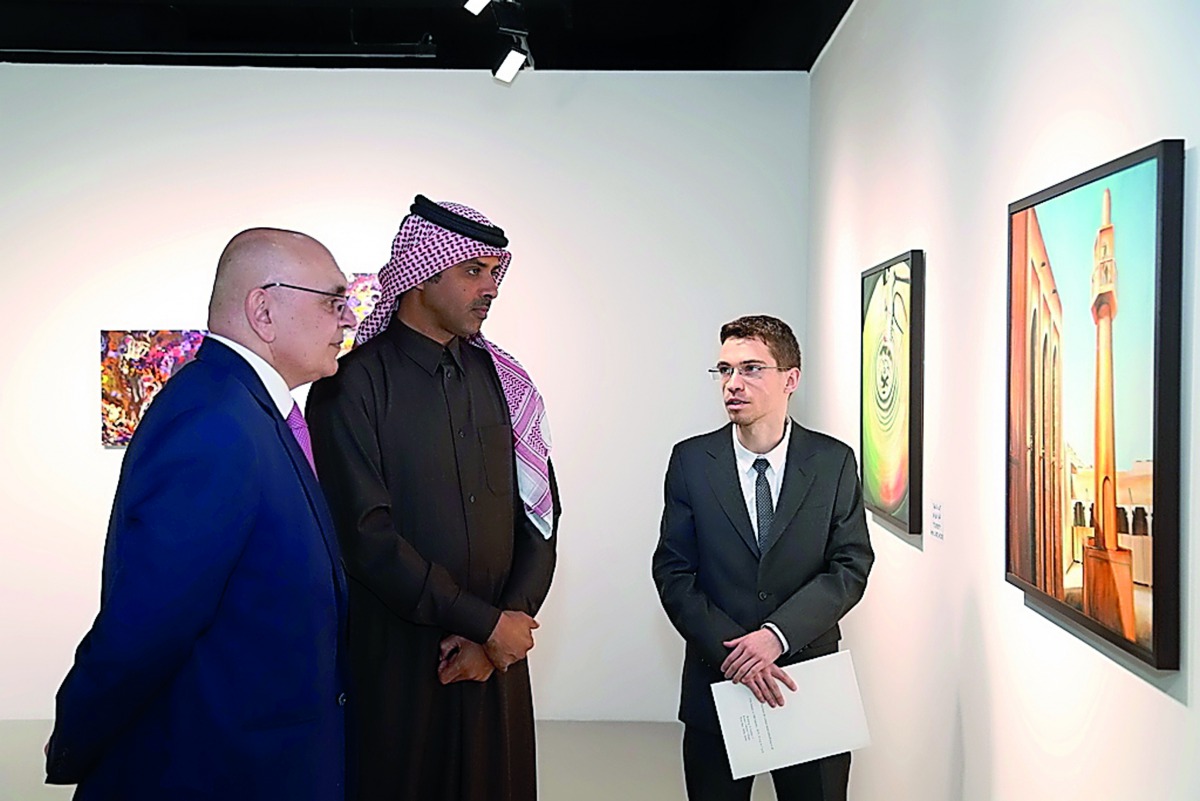 Katara’s Human Resources Manager, Saif Al Dosary (centre), along with curator Francisco Lacerda and Pedro Laima of the Embassy of Portugal, tours the ‘Transitory Art’ exhibition during its launch on Wednesday.