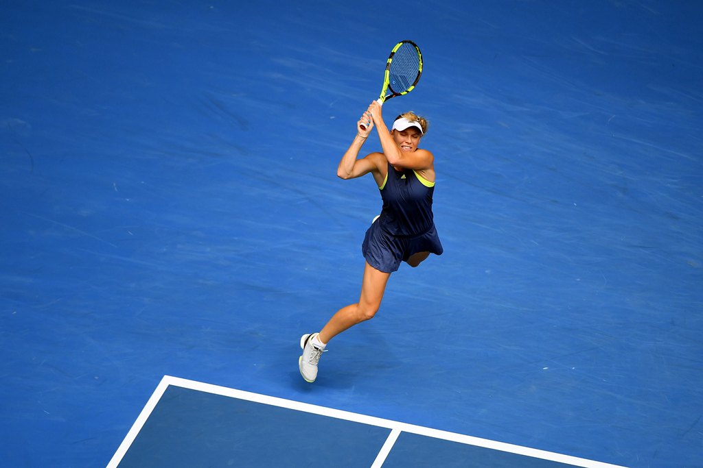 Caroline Wozniacki of Denmark in action against Magdalena Rybarikova of Slovakia during round four on day seven at the Australian Open tennis tournament, in Melbourne, Victoria, Australia, 21 January 2018. EPA/LUKAS COCH