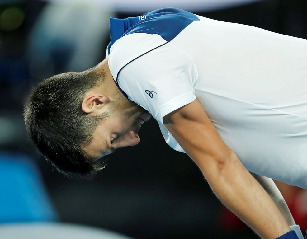 Novak Djokovic of Serbia reacts during his fourth round match against Chung Hyeon of South Korea at the Australian Open Grand Slam tennis tournament in Melbourne, Australia, 22 January 2018. EPA/MAST IRHAM