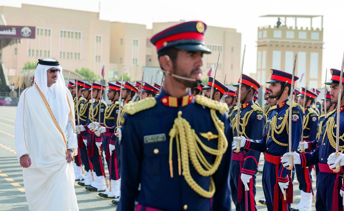 Emir H H Sheikh Tamim bin Hamad Al Thani patronised the graduation ceremony of the 13th class of officer cadets from Ahmed bin Mohammed Military College, which was held in the College field yesterday. The ceremony was attended by First Deputy Prime Minist