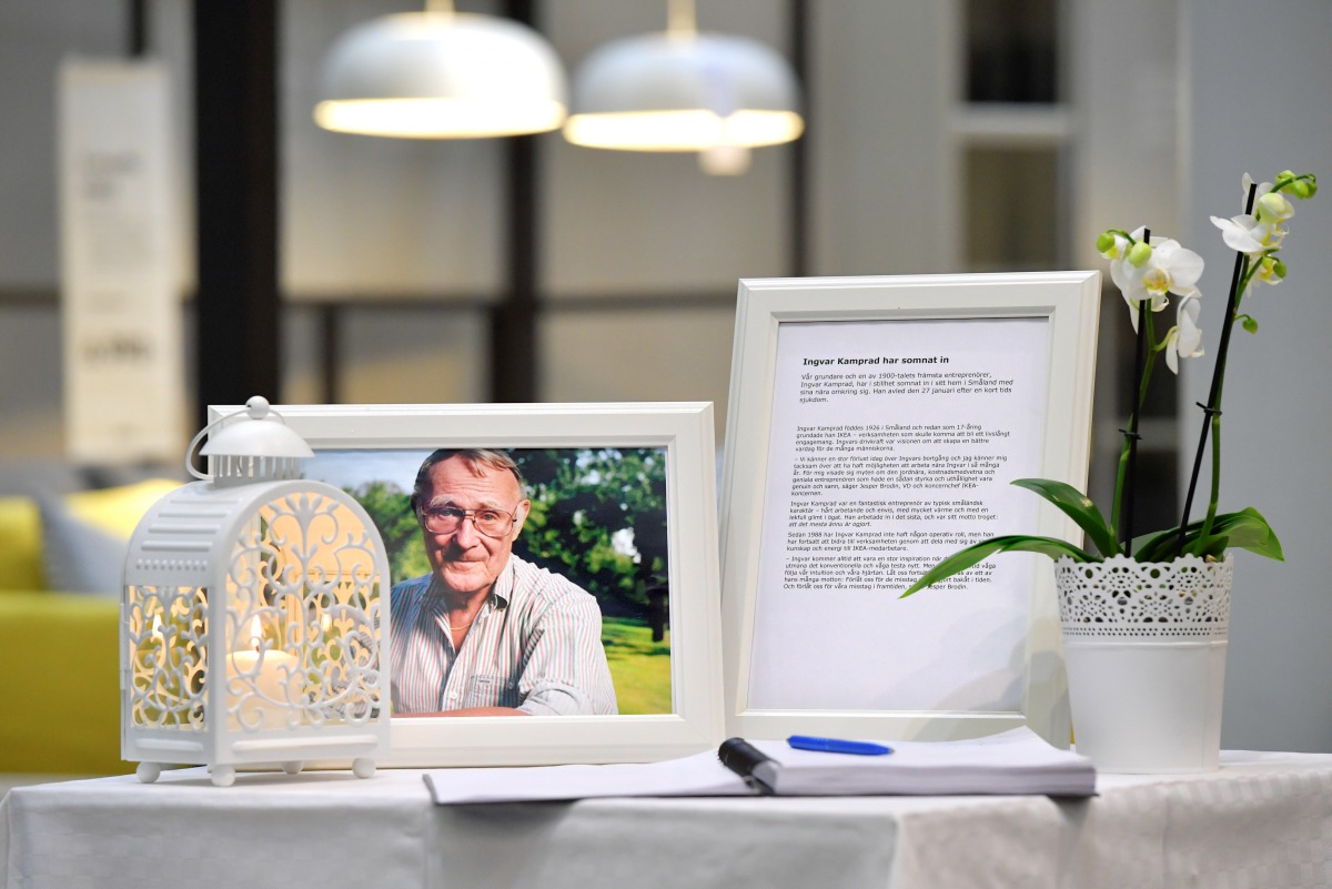 A photo of Ingvar Kamprad, founder of Swedish multinational furniture retailer IKEA, and a book of condolences are placed at the entrance of an IKEA store in Stockholm, Sweden, January 28, 2018. TT News Agency/Anders Wiklund/via Reuters