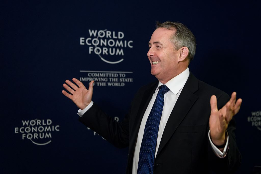 Britain's International Trade Secretary Liam Fox gestures during the annual World Economic Forum (WEF) on January 23, 2018 in Davos, eastern Switzerland. AFP / Fabrice COFFRINI
