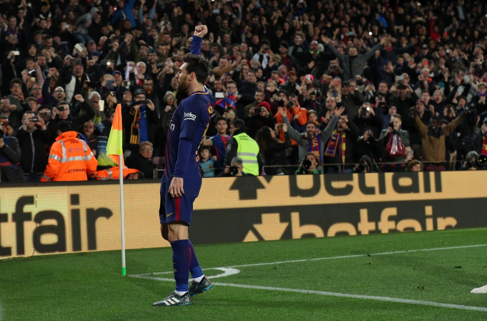 Lionel Messi celebrates scoring their second goal REUTERS/Albert Gea