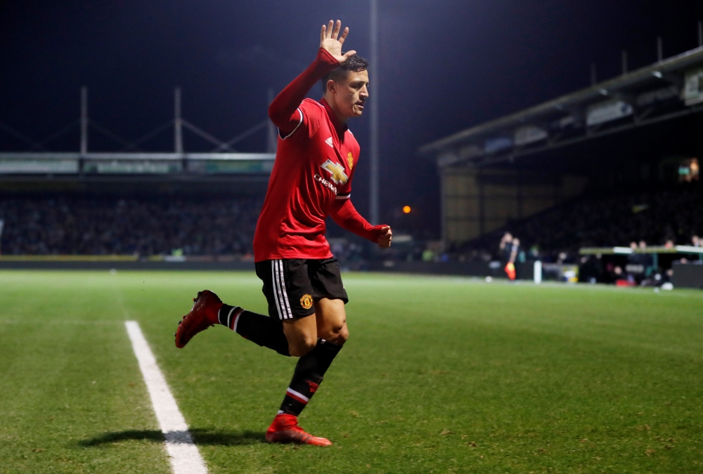 Manchester United’s Alexis Sanchez waves to the fans Action Images via Reuters/Paul Childs
