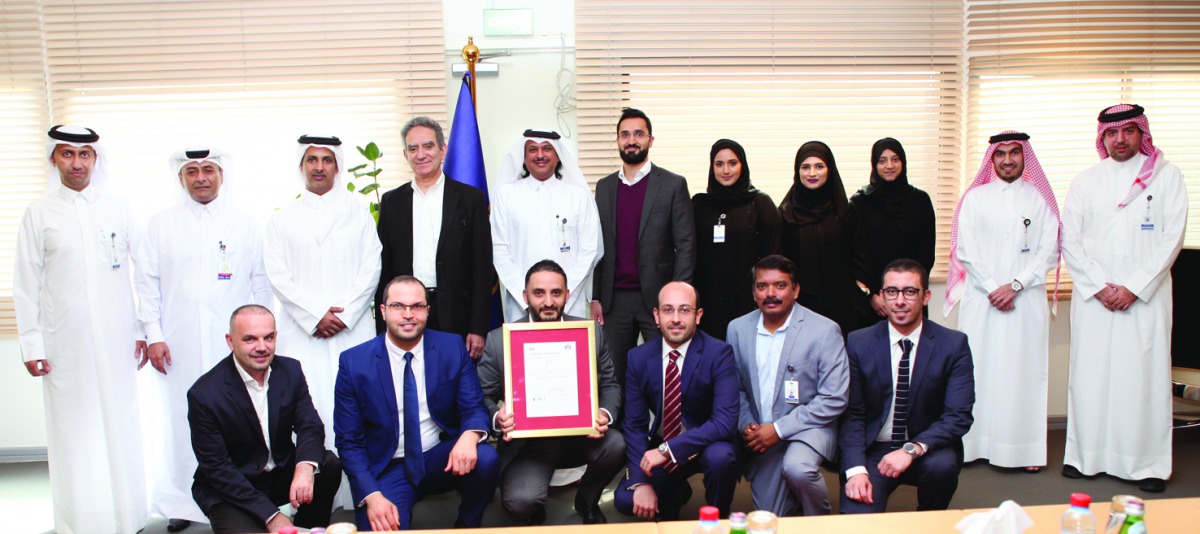  Ajay Sharma, the British Ambassador to Doha and Jamal Dalli, representative of the British Standards Institution, during the official presentation of the ISO certificate, at Al Jazeera  headquarters in Doha.
