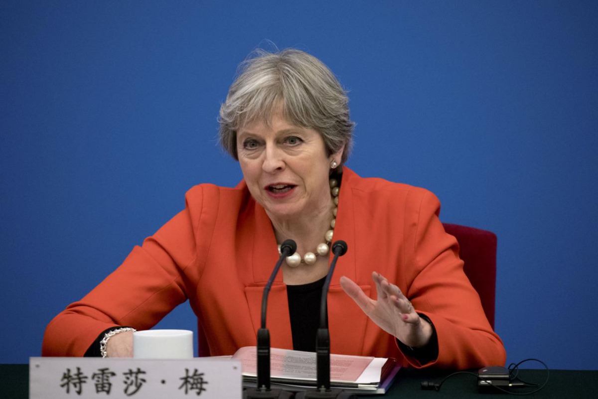 British Prime Minister THERESA May speaks during the inaugural meeting of the UK-China CEO Council at the Great Hall of the People in Beijing, China January 31, 2018. REUTERS/Mark Schiefelbein/Pool	