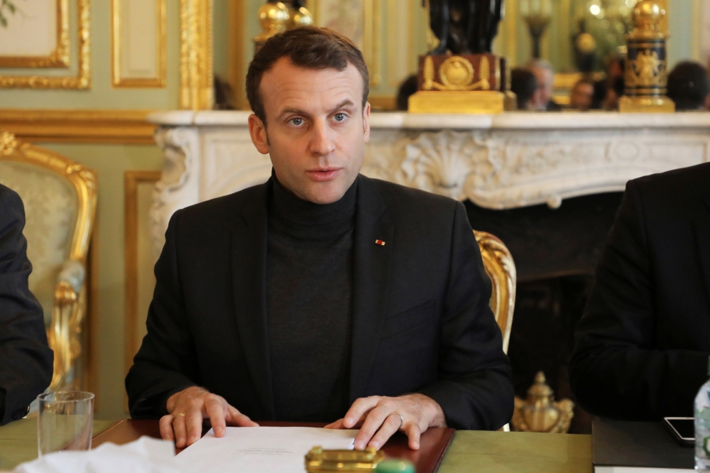 French President Emmanuel Macron speaks during a Trianon Council meeting (Conseil de coordination du dialogue de Trianon) aiming to strenghten the links between France and Russia at the Elysee Palace in Paris, France, Febuary 9, 2018. REUTERS/Ludovic Mari