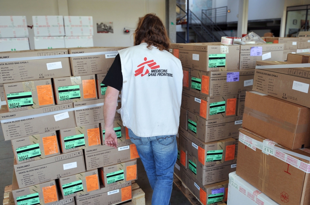 In this file photo taken on January 13 2010 a member of French association Doctors without borders is seen at the association logistics hub in Bordeaux-Merignac, as the association was getting ready to provide medicines in Haiti, following a huge earthqua