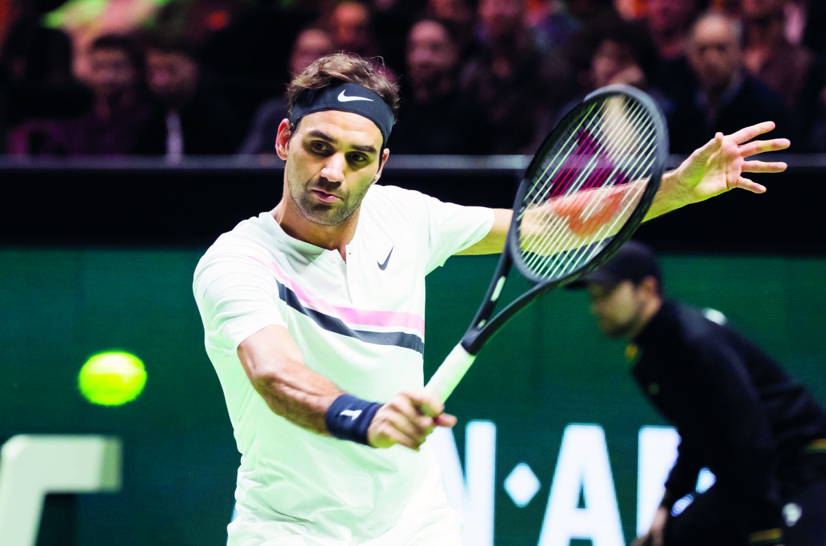 Swiss tennis player Roger Federer of Switzerland jubilates returns a ball to Germany Philipp Kohlschreiber during their second round match of the ABN AMRO World Tennis Tournament in Rotterdam on February 15, 2018. AFP / ANP / Koen Suyk