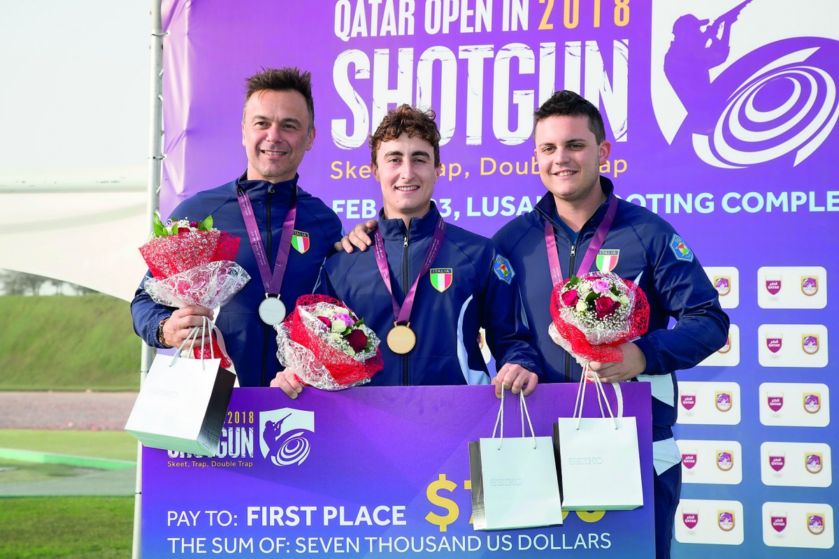 Andrea Vescovi (centre), winner in the Double Trap event at the Qatar Open Shotgun Championship is flanked by compatriots Daniele de Spigno (left) and Aegnazio Tronca at the all-Italian podium finish at the Losail Shooting Range yesterday.