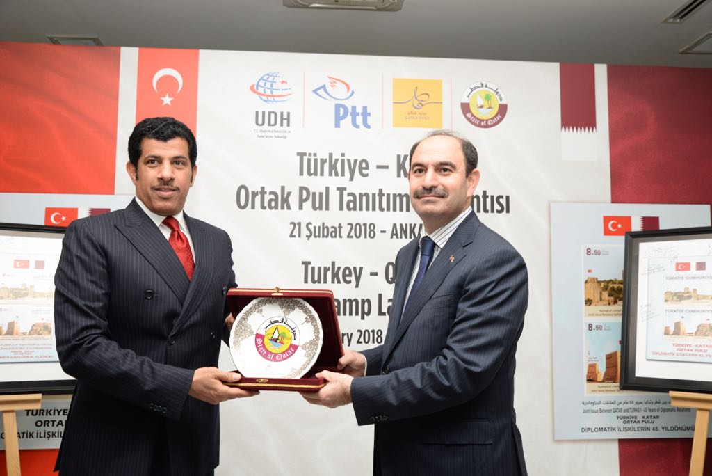 Qatar’s Ambassador to Turkey, Salem bin Mubarak Al Shafi, and Director-General of the Turkish Postal Corporation, Kenan Bozgeyik, with the commemorative stamp.