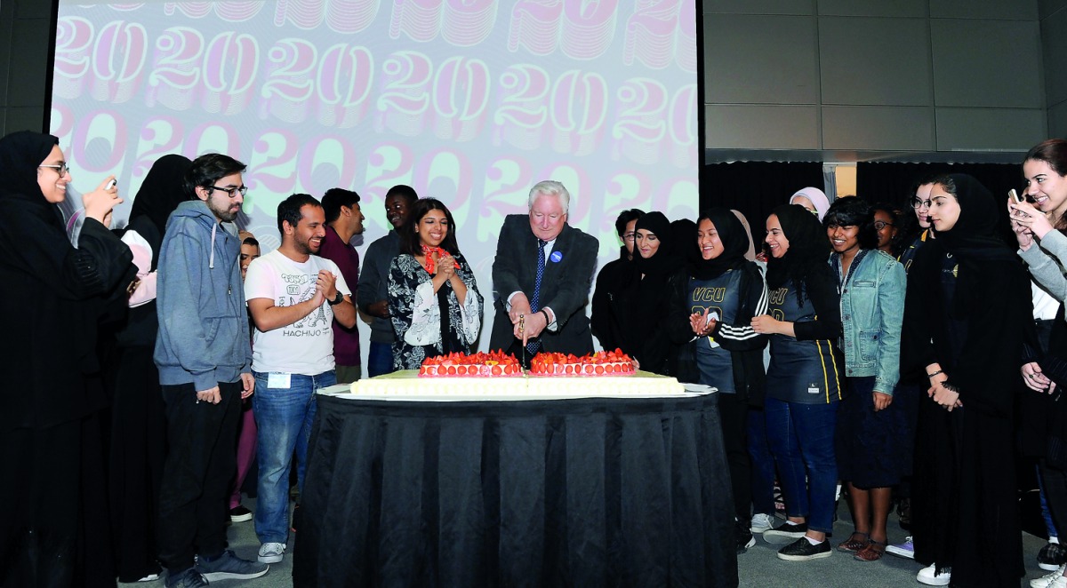 Dr Donald N Baker, Executive Dean of VCUarts Qatar (centre), with students during a cake cutting ceremony held as part of a celebration held yesterday to mark the campus’ 20 years of presence in Qatar. 
Pic: Salim Matramkot  / The Peninsula 