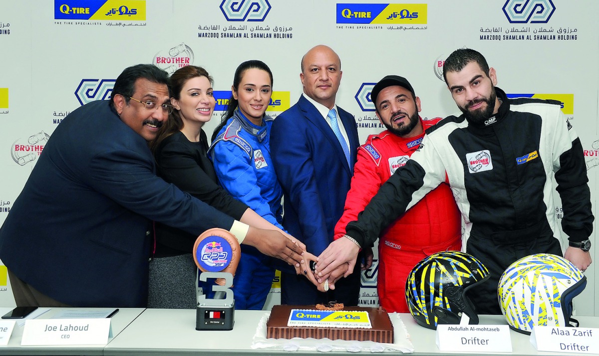 Joe Lahoud (fourth left), Group CEO, Marzooq Shamlan Al Shamlan Holding; with (from left) Saju Eapen, Retail Manager, Q-Tire; Carine Nehme Kassis, Group Marketing and Communication Director of Marzooq Shamlan Al Shamlan Holding; Nada Zeidan, Rally Driver;