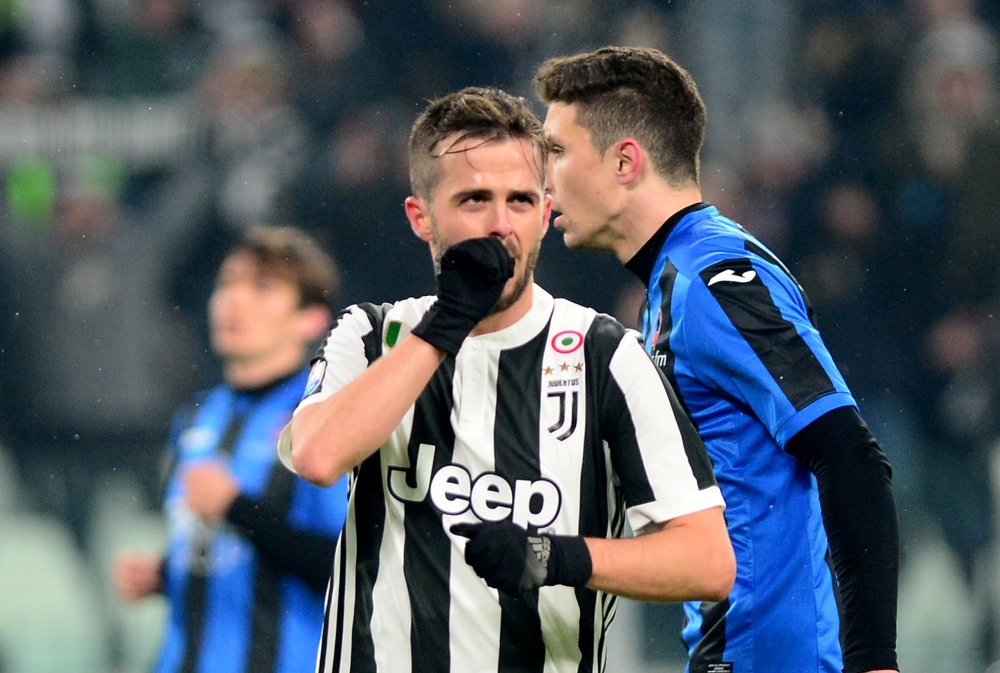 Juventus’ Miralem Pjanic celebrates scoring their first goal REUTERS/Massimo Pinca
