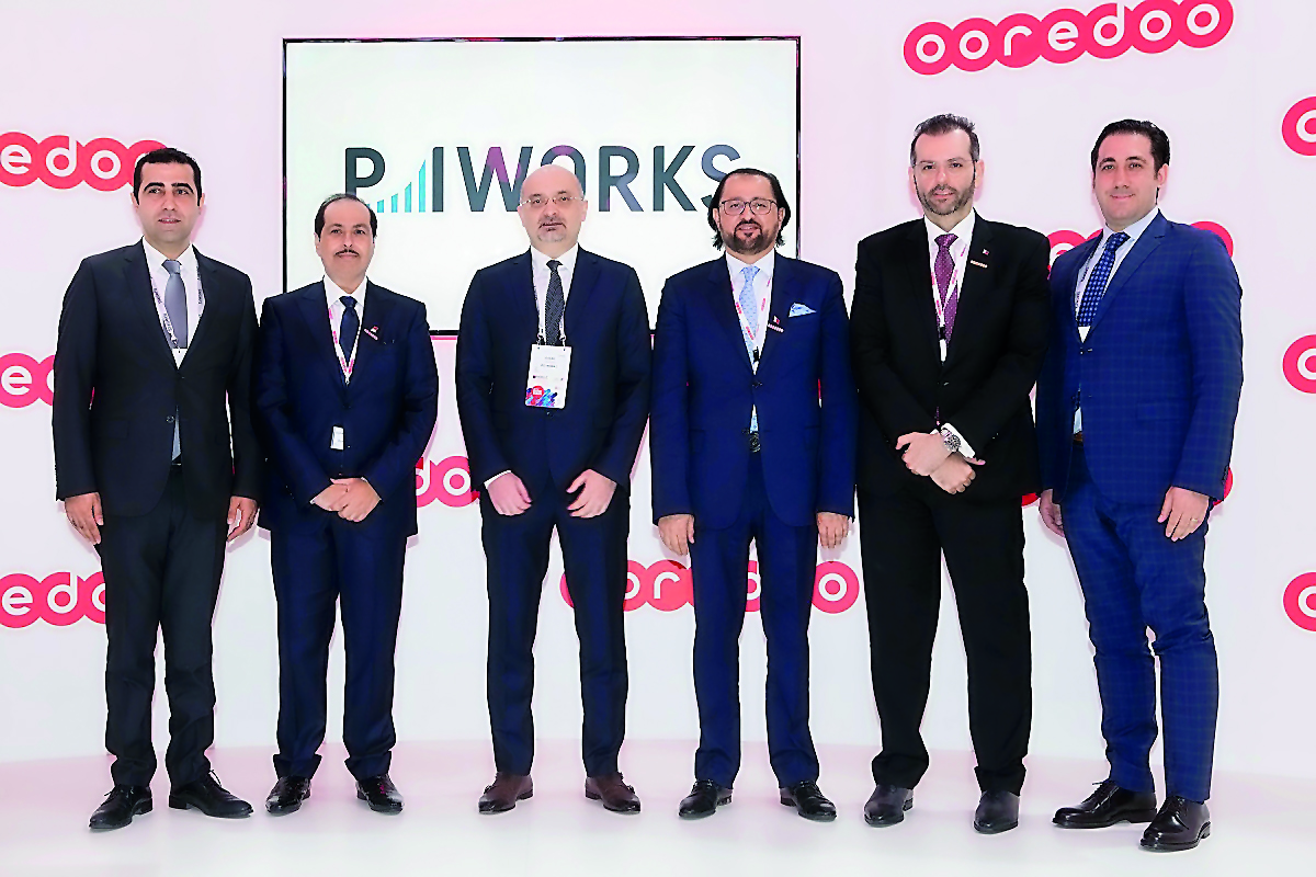 Ooredoo and PI Works officials during the announcement.