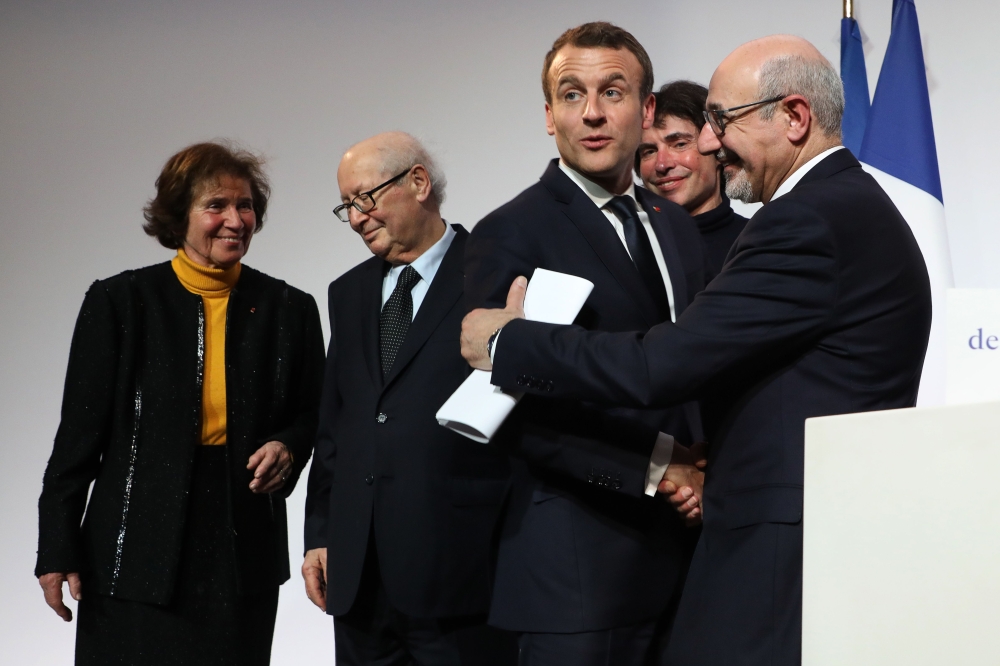 
Nazi hunters Beate and Serge Klarsfeld, French President Emmanuel Macron, French-Israeli lawyer Arno Klarsfeld and CRIF president Francis Kalifat attend the 33rd annual dinner of the Representative Council of Jewish Institutions of France (CRIF - Consei