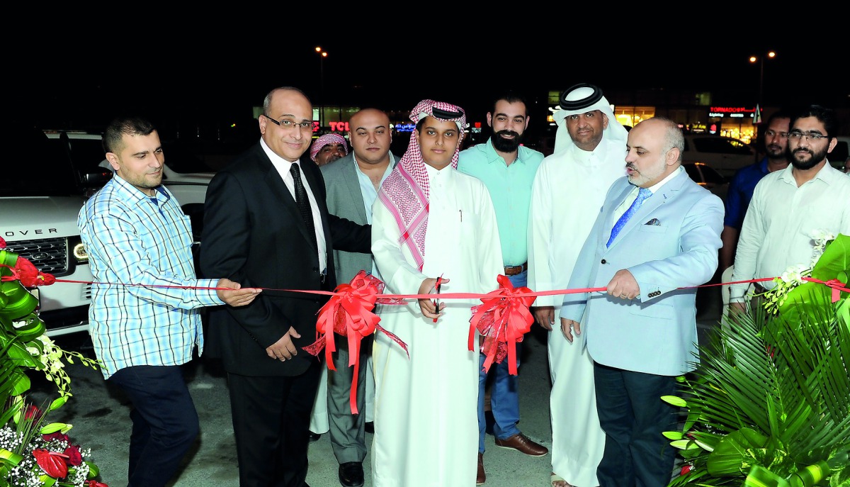 Abdulrahman Mohammed Khalifa Al Attiyah opening the showroom on Salwa Road along with Samir Azzam, Abdul Rahman Al Emadi, Osman Al Asmar, Mohammed Al Zuabi, Eng Mohammed Hassan, Hani Al Sayed and other dignitaries.