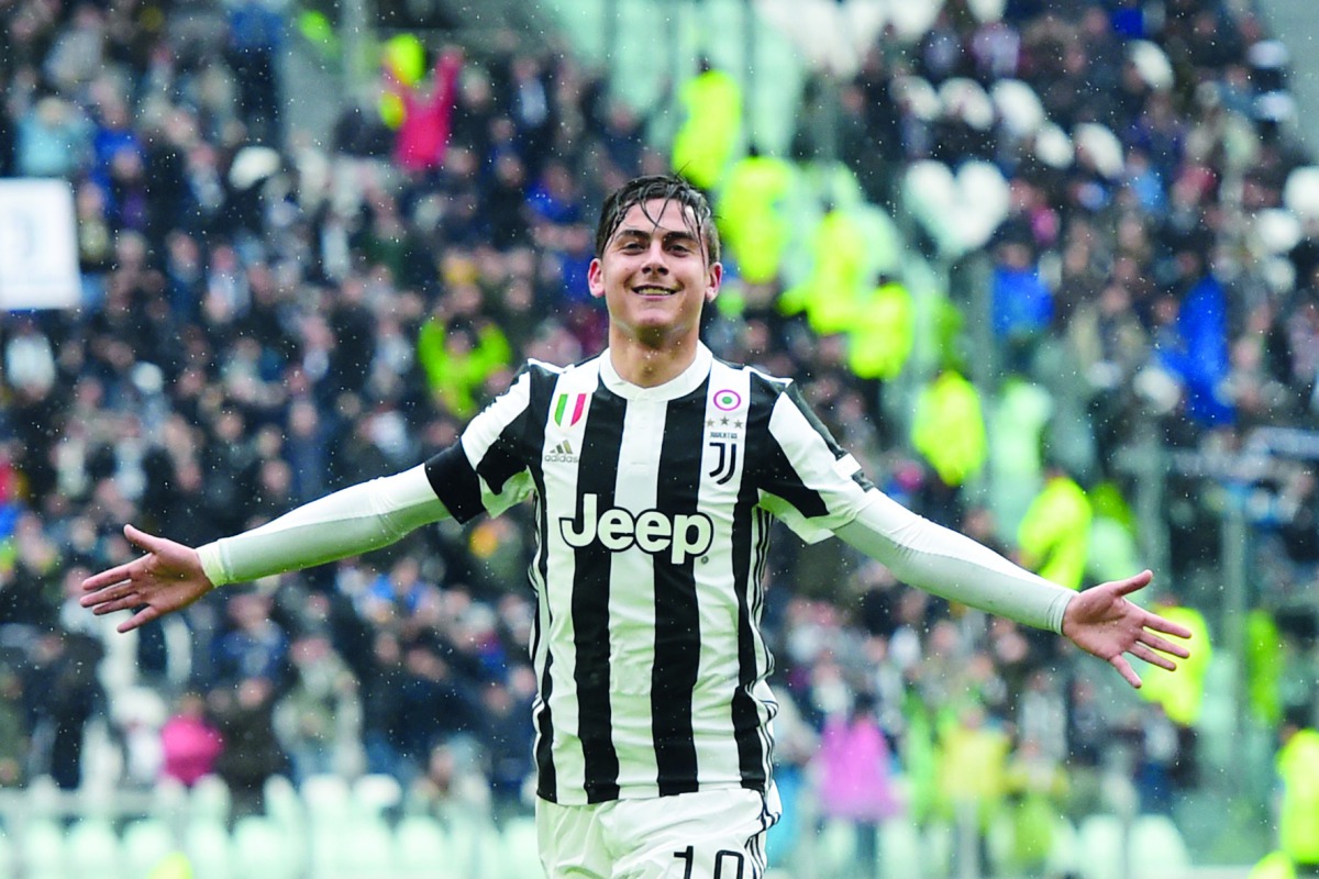 Juventus' forward from Argentina Paulo Dybala celebrates after scoring during the Italian Serie A football match Juventus vs Udinese on March 11, 2018 at the Juventus stadium in Turin. AFP / Miguel Medina