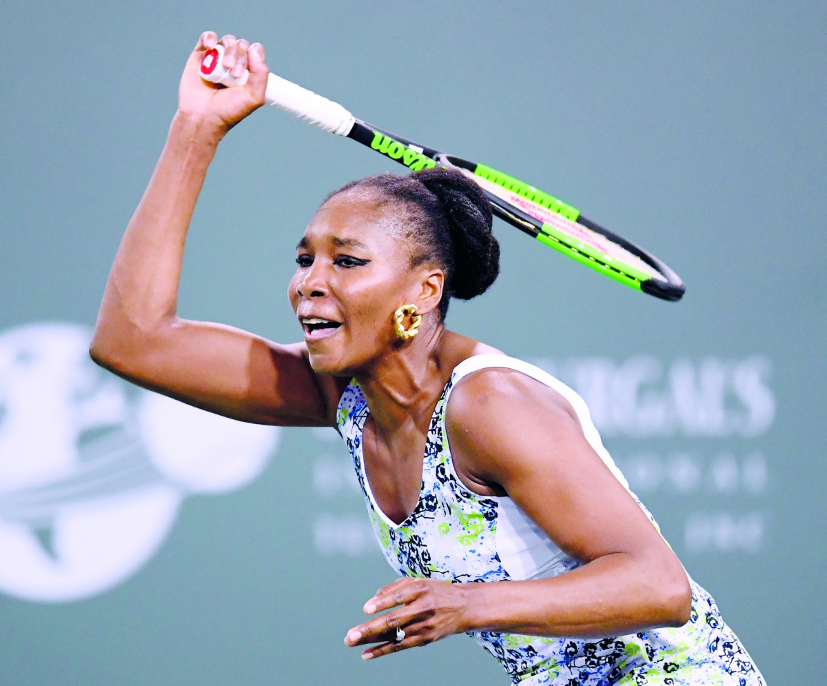 Venus Williams of the United States reacts to her forehand in her match against Serena Williams of the United States during the BNP Paribas Open at the Indian Wells Tennis Garden on March 12, 2018 in Indian Wells, California. Harry How/Getty Images/AFP 