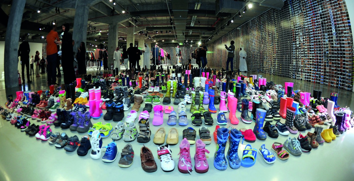 Thousands of articles of clothing and photos are on display at Laundromat, the first-ever exhibition by renowned Chinese artist Ai Weiwei in the Gulf, launched yesterday at the Fire Station. Pics: Salim Matramkot / The Peninsula