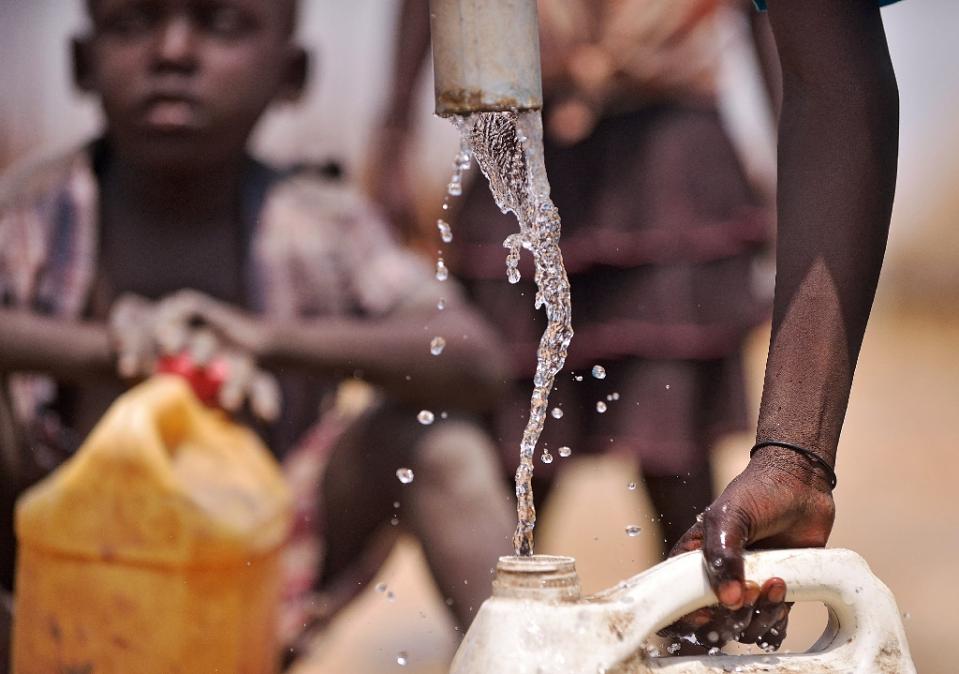 Globally, the numbers of people forced to leave home because of water shortages, crop failures, sea-level rise, storm surges and other climate threats are likely to be much higher, researchers said. (AFP file photo / Tony Karumba) 