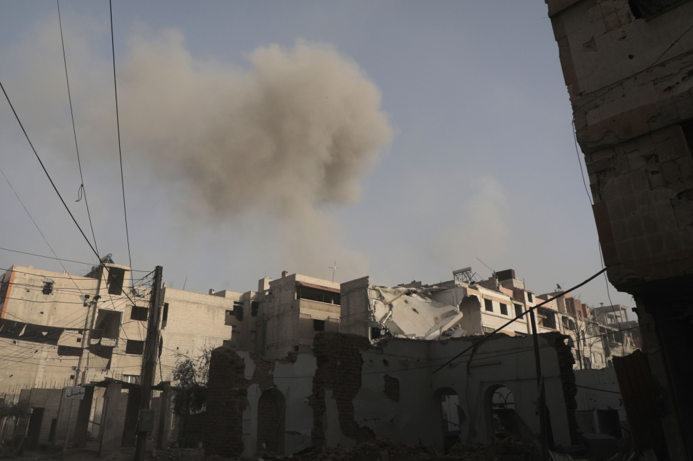 The fighting in Qadam, which is south of Damascus, comes as eastern Ghouta suburbs of the country's capital is under attack. AFP / HAMZA AL-AJWEH